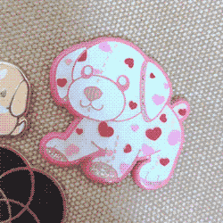 enamel pin of a webkinz love puppy