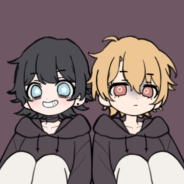 two boys in dark hoodies sitting next to each other