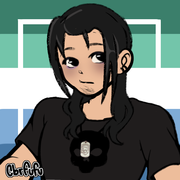 long-haired man in all black standing in front of gay male pride flag