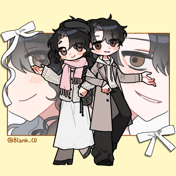 man and woman in winter clothes standing with their arms interlocked