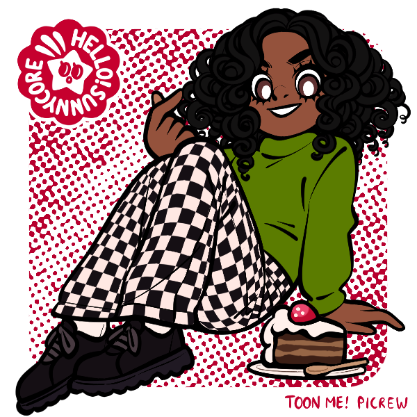 stylish feminine girlboy in checkered pants sitting next to chocolate cake