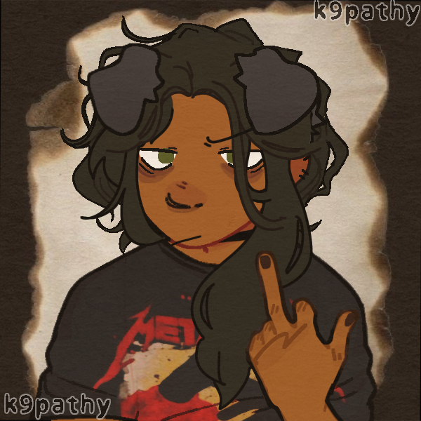 long-haired dog boy in all black holding up middle finger