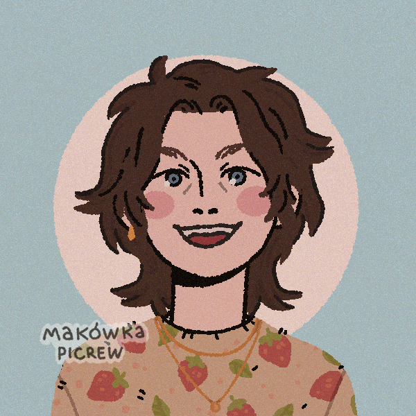 androgynous person with shaggy hair and a strawberry sweater
