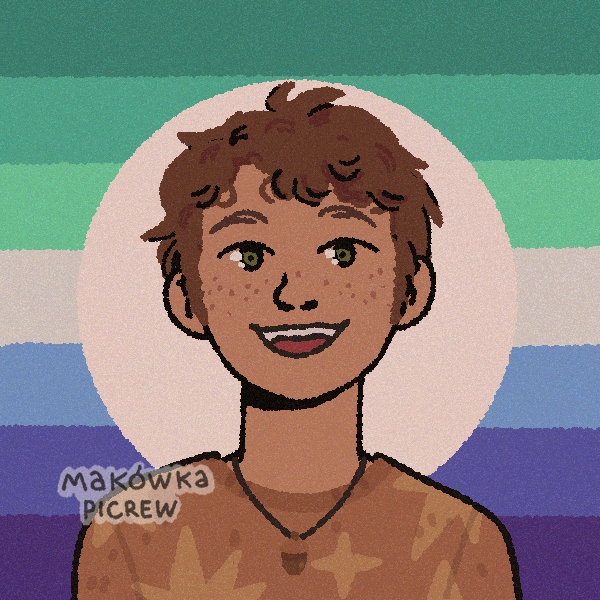 curly-haired, freckled boy in front of gay male flag